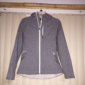 Waterproof tech jacket zippered pockets